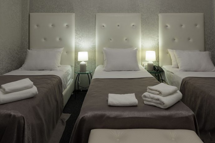 Imagen de la habitación del Hotel Piazza, Tbilisi. Foto 11