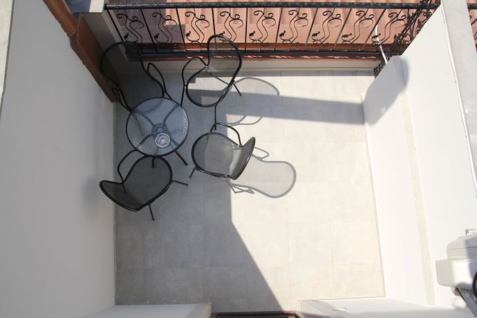 Imagen de la habitación del Hotel Piazza, Tbilisi. Foto 15