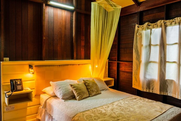 Imagen de la habitación del Hotel Picard Beach Cottages. Foto 22