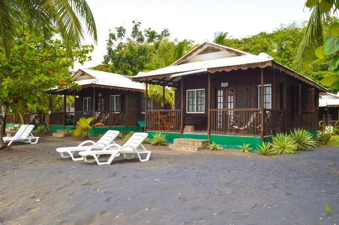 Imagen de la habitación del Hotel Picard Beach Cottages. Foto 23