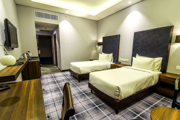 Imagen de la habitación del Hotel Piccadily Raipur. Foto 11