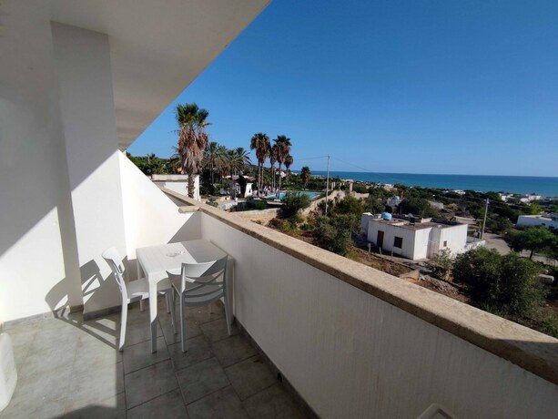 Imagen de la habitación del Hotel Picchio Pescoluse. Foto 17