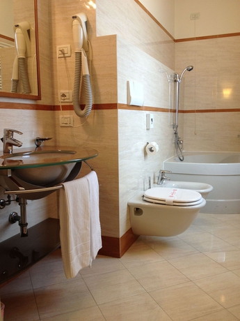 Imagen de la habitación del Hotel Piccola Vela. Foto 9