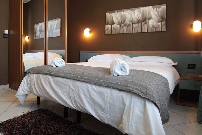 Imagen de la habitación del Hotel Piccolo Allamano. Foto 5