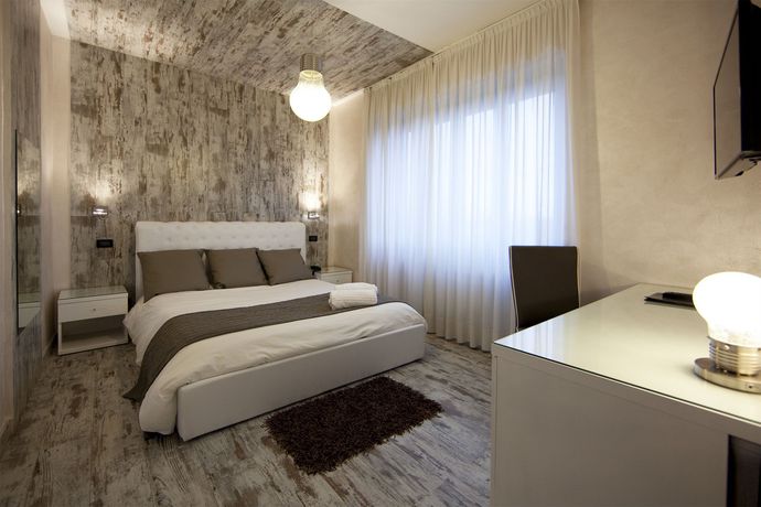 Imagen de la habitación del Hotel Piccolo Allamano. Foto 10