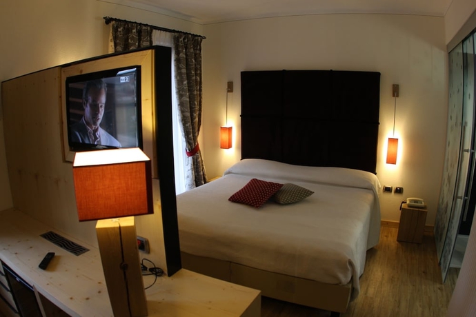 Imagen de la habitación del Hotel Piccolo Andalo Suite Resort. Foto 6