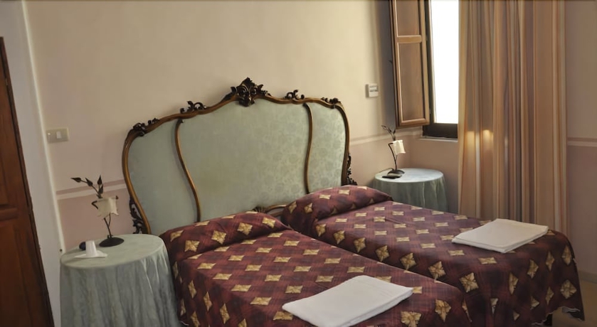 Imagen de la habitación del Hotel Piccolo Casa Mia. Foto 13