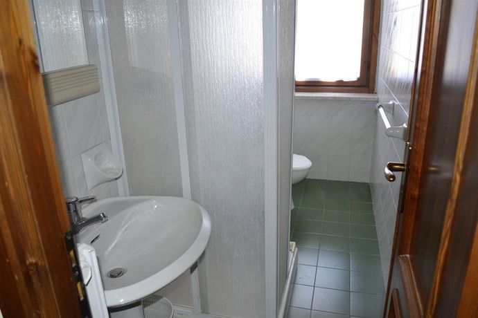 Imagen de la habitación del Hotel Piccolo Chalet. Foto 7