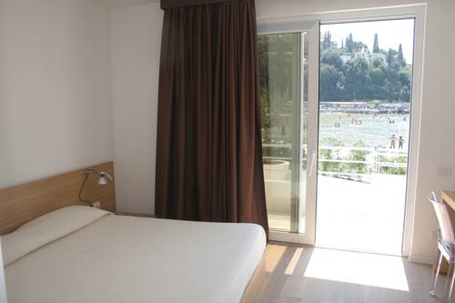 Imagen de la habitación del Hotel Piccolo Del Lido. Foto 11