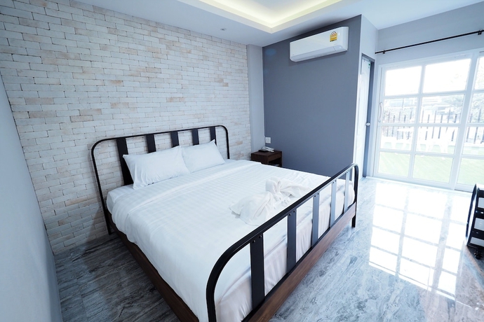 Imagen de la habitación del Hotel Piccolo House. Foto 11