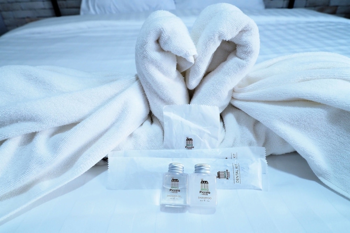 Imagen de la habitación del Hotel Piccolo House. Foto 15