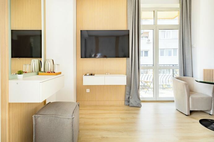 Imagen de la habitación del Hotel Piccolo Mondo by CityBookings. Foto 18