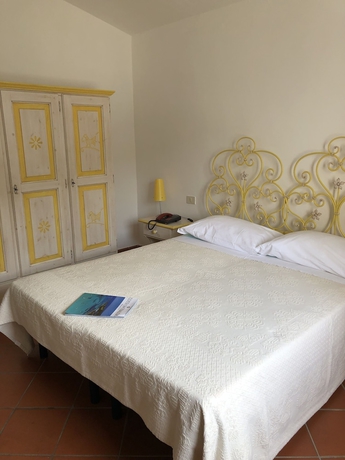 Imagen de la habitación del Hotel Piccolo Pevero. Foto 11