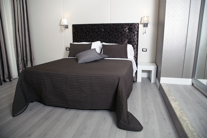 Imagen de la habitación del Hotel Piccolo Piazza Di Spagna Suites. Foto 10