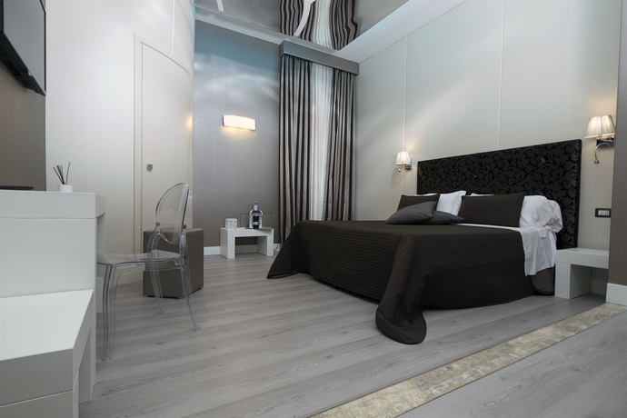 Imagen de la habitación del Hotel Piccolo Piazza Di Spagna Suites. Foto 12