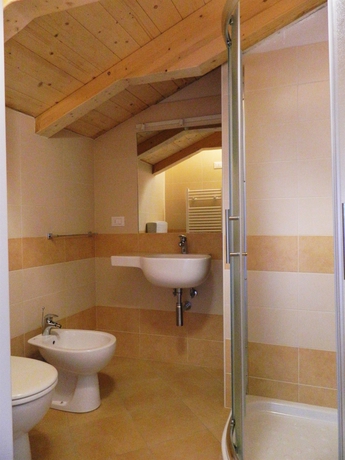 Imagen de la habitación del Hotel Piccolo Tanamalia. Foto 5