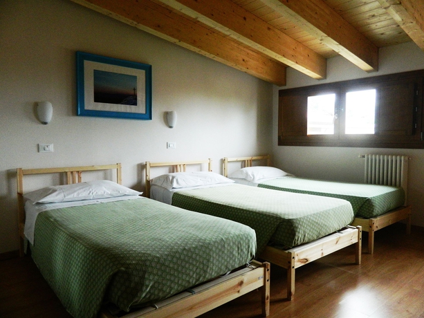 Imagen de la habitación del Hotel Piccolo Tanamalia. Foto 9