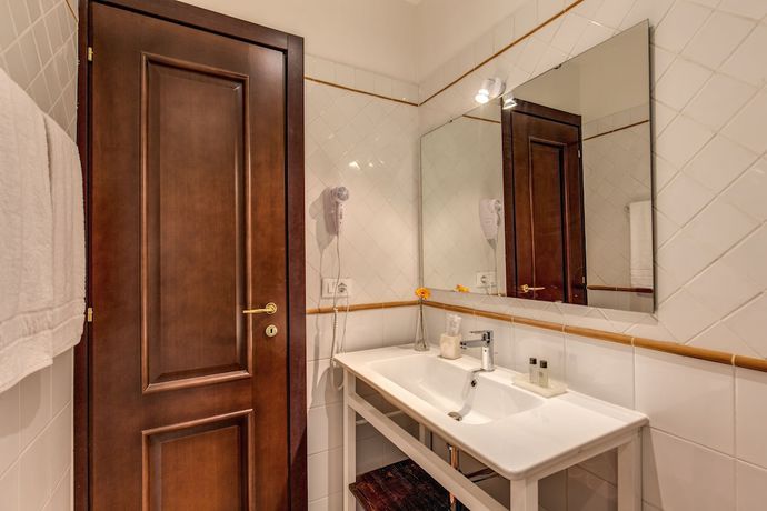 Imagen de la habitación del Hotel Piccolo Trevi Suites. Foto 2
