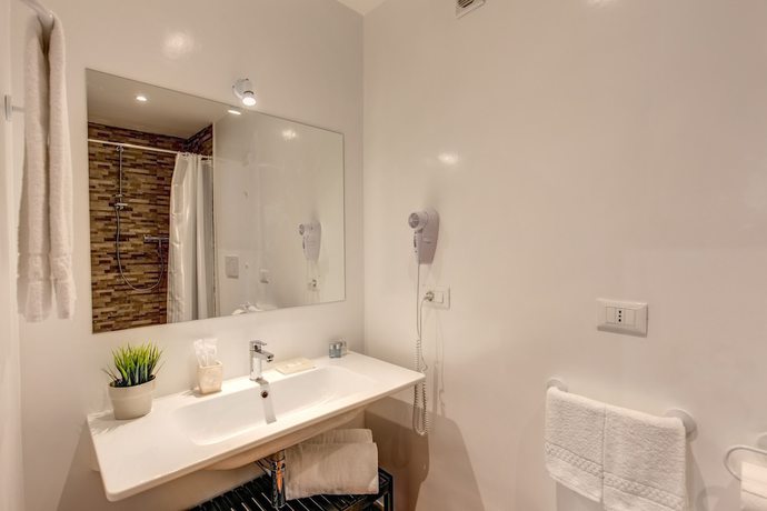 Imagen de la habitación del Hotel Piccolo Trevi Suites. Foto 4