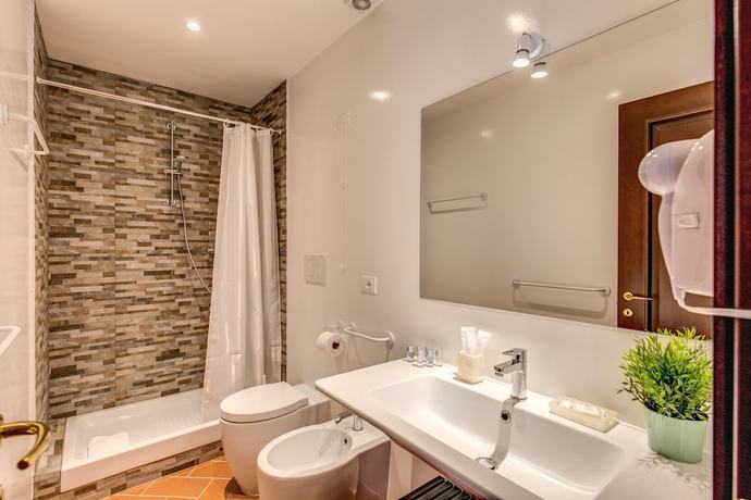 Imagen de la habitación del Hotel Piccolo Trevi Suites. Foto 6