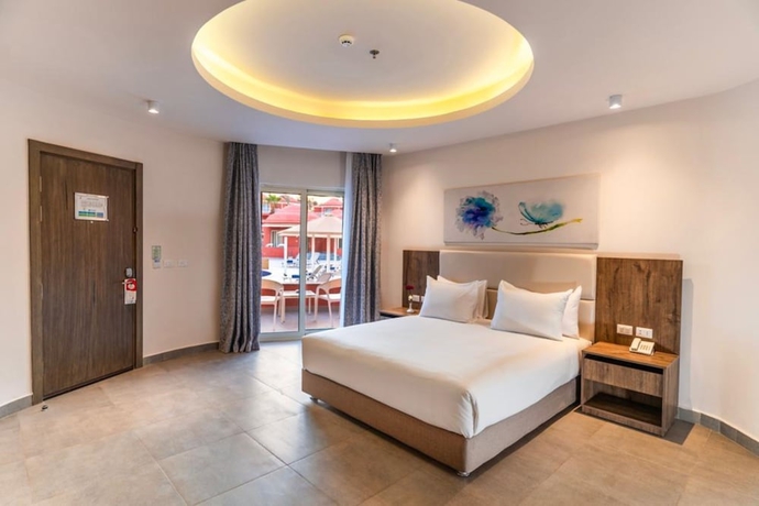 Imagen de la habitación del Hotel Pickalbatros Laguna Club Resort Sharm El Sheikh. Foto 2