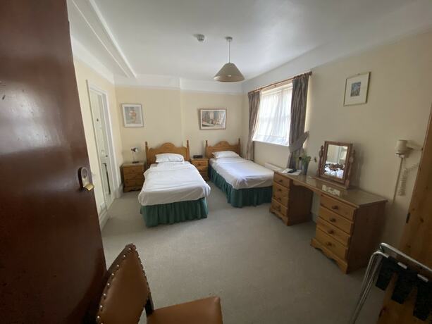 Imagen de la habitación del Hotel Pickwicks Guest House. Foto 14