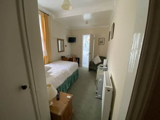 Imagen de la habitación del Hotel Pickwicks Guest House. Foto 19