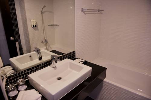 Imagen de la habitación del Hotel Picnic Bangkok. Foto 4