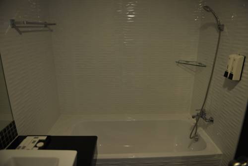 Imagen de la habitación del Hotel Picnic Bangkok. Foto 11