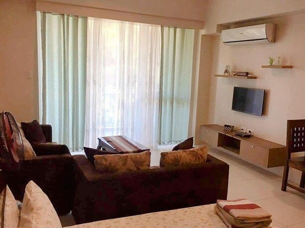 Imagen de la habitación del Hotel Pico De Loro Hamilo Coast Guest House. Foto 17