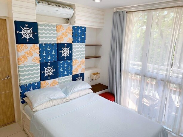 Imagen de la habitación del Hotel Pico De Loro Hamilo Coast Guest House. Foto 26