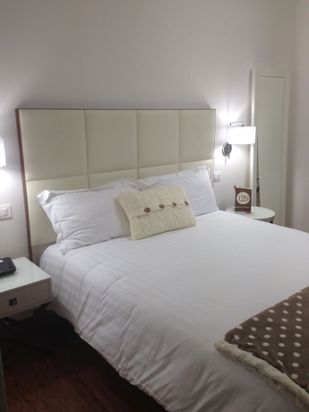 Imagen de la habitación del Hotel Piero Della Francesca. Foto 11