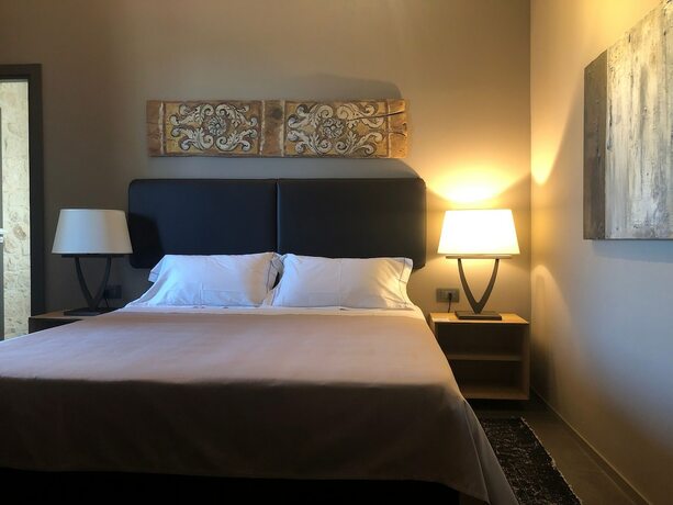 Imagen de la habitación del Hotel Pietra d'Acqua. Foto 11