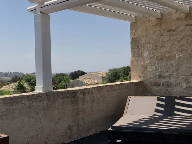 Imagen de la habitación del Hotel Pietra d'Acqua. Foto 16