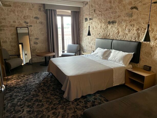 Imagen de la habitación del Hotel Pietra d'Acqua. Foto 18