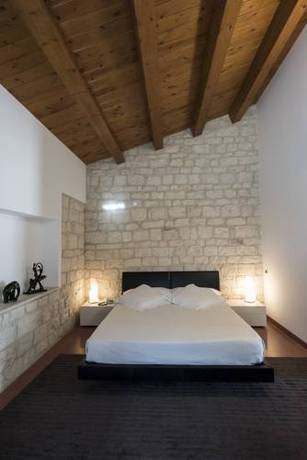 Imagen de la habitación del Hotel Pietre Nere Resort. Foto 4