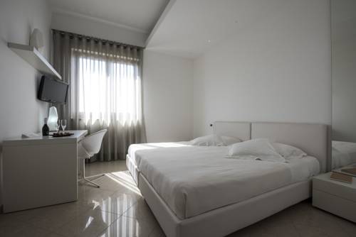 Imagen de la habitación del Hotel Pietre Nere Resort. Foto 7