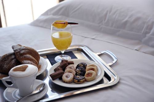 Imagen de la habitación del Hotel Pietre Nere Resort. Foto 12