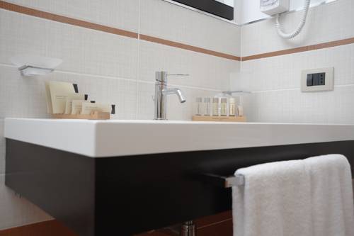 Imagen de la habitación del Hotel Pietre Nere Resort. Foto 13