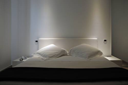 Imagen de la habitación del Hotel Pietre Nere Resort. Foto 14