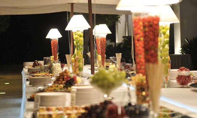 Imagen del bar/restaurante del Hotel Pietre Rosse Residence Club Palinuro. Foto 6