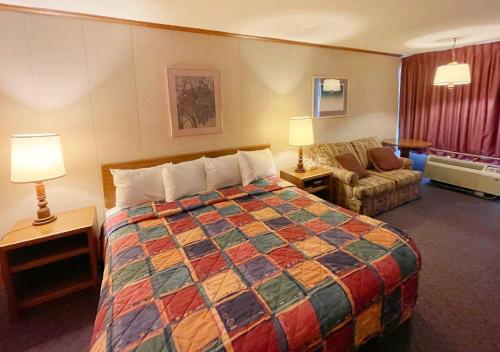 Imagen de la habitación del Hotel Pigeon Forge Motor Lodge Downtown. Foto 13