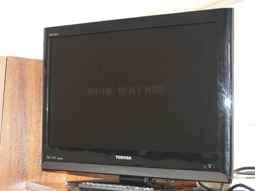 Imagen de la habitación del Hotel Pigeon House Motor Inn. Foto 4