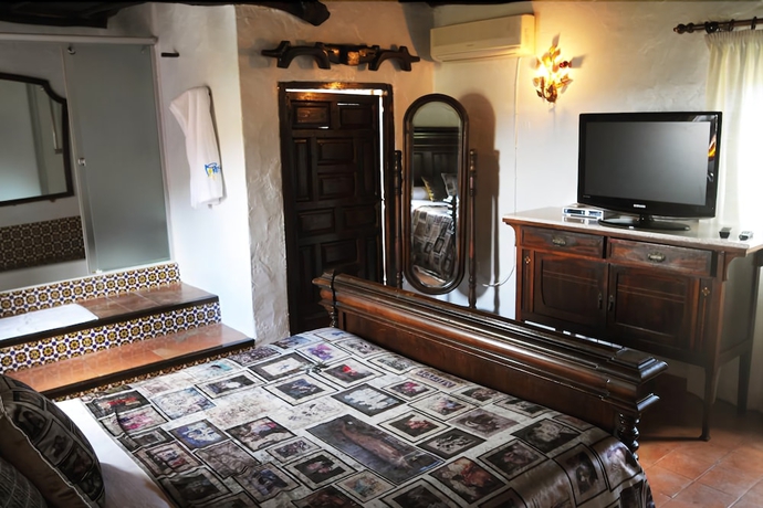 Imagen de la habitación del Hotel Pikes Ibiza - Adults Only. Foto 11