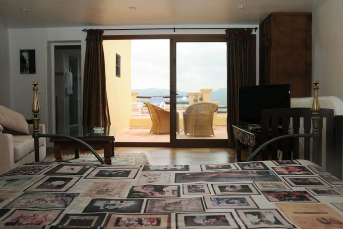 Imagen de la habitación del Hotel Pikes Ibiza - Adults Only. Foto 14