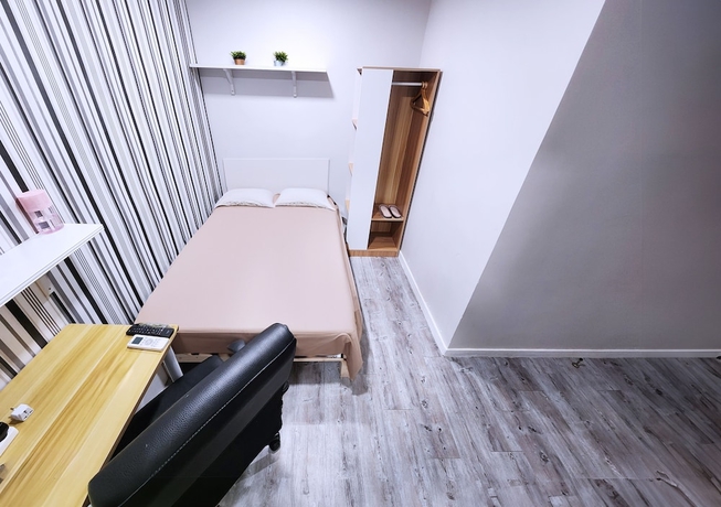Imagen de la habitación del Hotel Pillows Co-Living. Foto 4