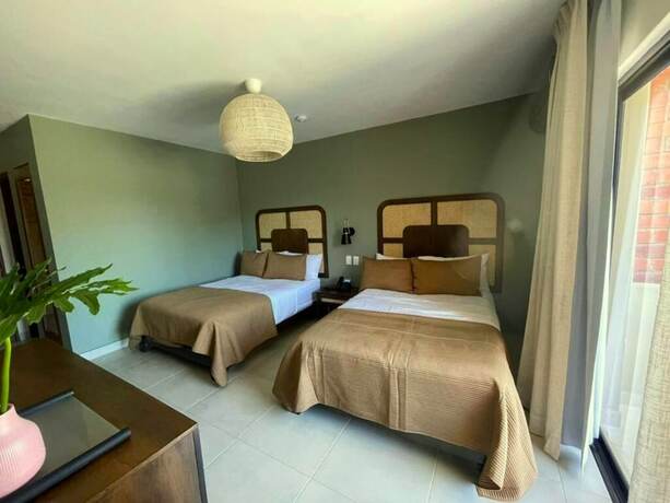 Imagen de la habitación del Hotel Pinar Dorado by Gran Jimenoa, Jarabacoa. Foto 10
