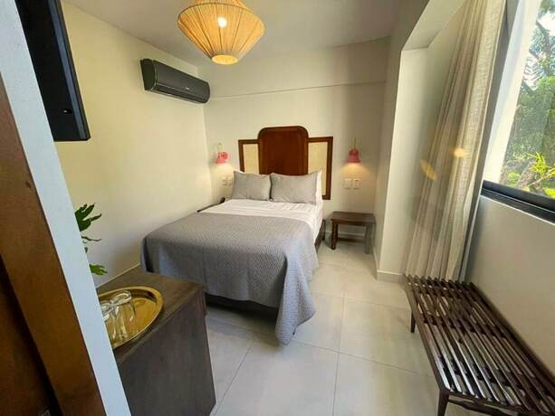 Imagen de la habitación del Hotel Pinar Dorado by Gran Jimenoa, Jarabacoa. Foto 11