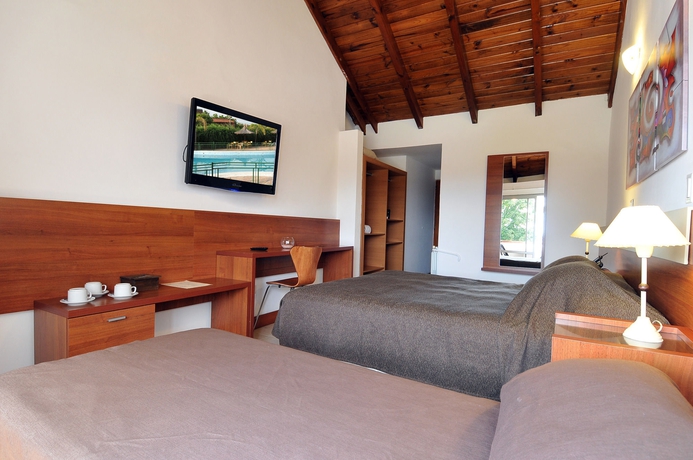 Imagen de la habitación del Hotel Pinares Del Cerro Resort and Suites. Foto 6