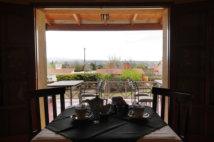 Imagen del bar/restaurante del Hotel Pinares Del Cerro Resort and Suites. Foto 3
